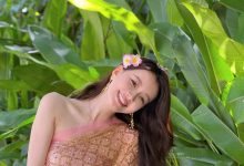 【乐玩LEWIN】孙怡晒西双版纳游玩照 穿少数民族服饰笑容甜美-乐玩真人线上娱乐