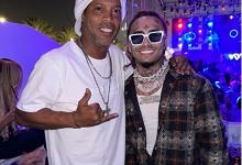 迈博体育 美国说唱歌手与小罗合影-乐玩真人线上娱乐